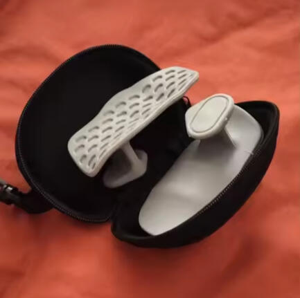 Grippies 2.0 premium hand grips for men and women strength training in a fitness gym setting.