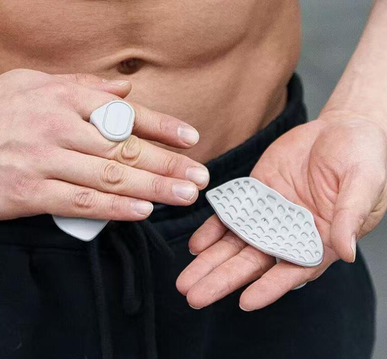 Professional gym grips for deadlifts providing non-slip palm protection on a heavy Olympic barbell.